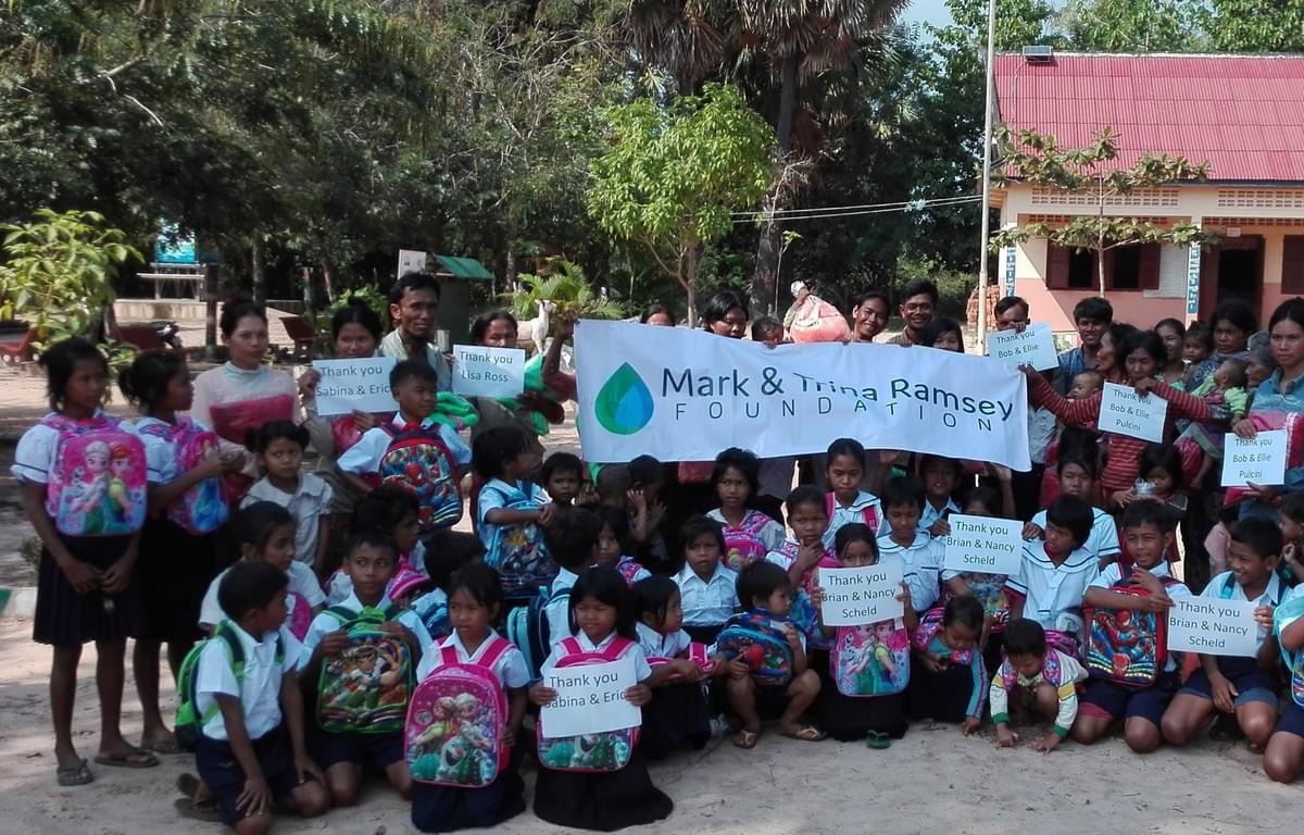 Cambodian Families expressing gratitude for school uniforms/backpacks/supplies and mosquito nets donated by supporters of Mark & Trina Ramsey Foundation Cambodian Families expressing gratitude for school uniforms/backpacks/supplies and mosquito nets donated by supporters of Mark & Trina Ramsey Foundation