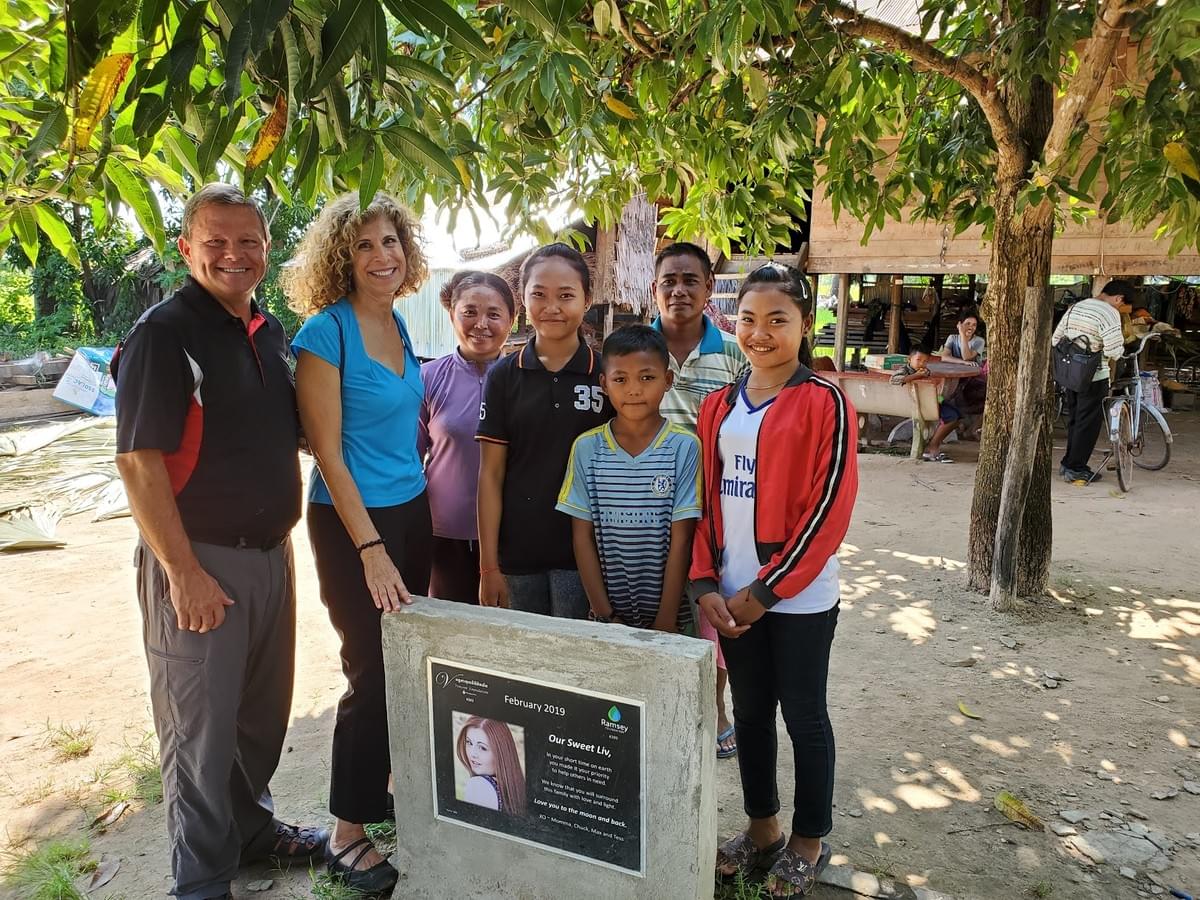 Mark & Trina with a Camobian family that received a water well dedicated in loving memory of Liv Mark & Trina with a Camobian family that received a water well dedicated in loving memory of Liv