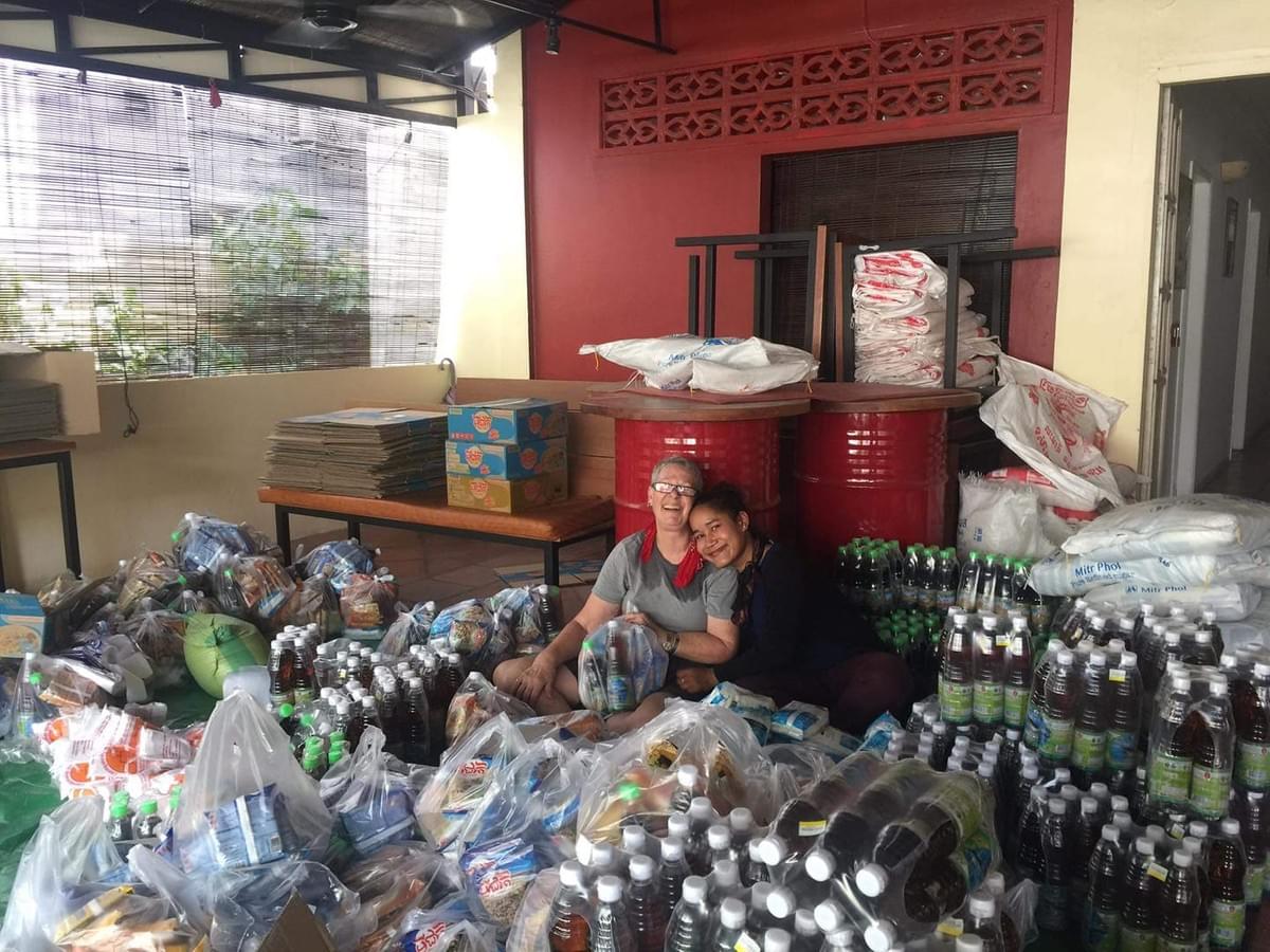 Jill Morse, from our partner, RSSO, and one of their volunteers surrounded by a sea of food items they're aseembling into care packages to be donated to Cambodians in need...clearly al labor of love! Jill Morse, from our partner, RSSO, and one of their volunteers surrounded by a sea of food items they're aseembling into care packages to be donated to Cambodians in need...clearly al labor of love!