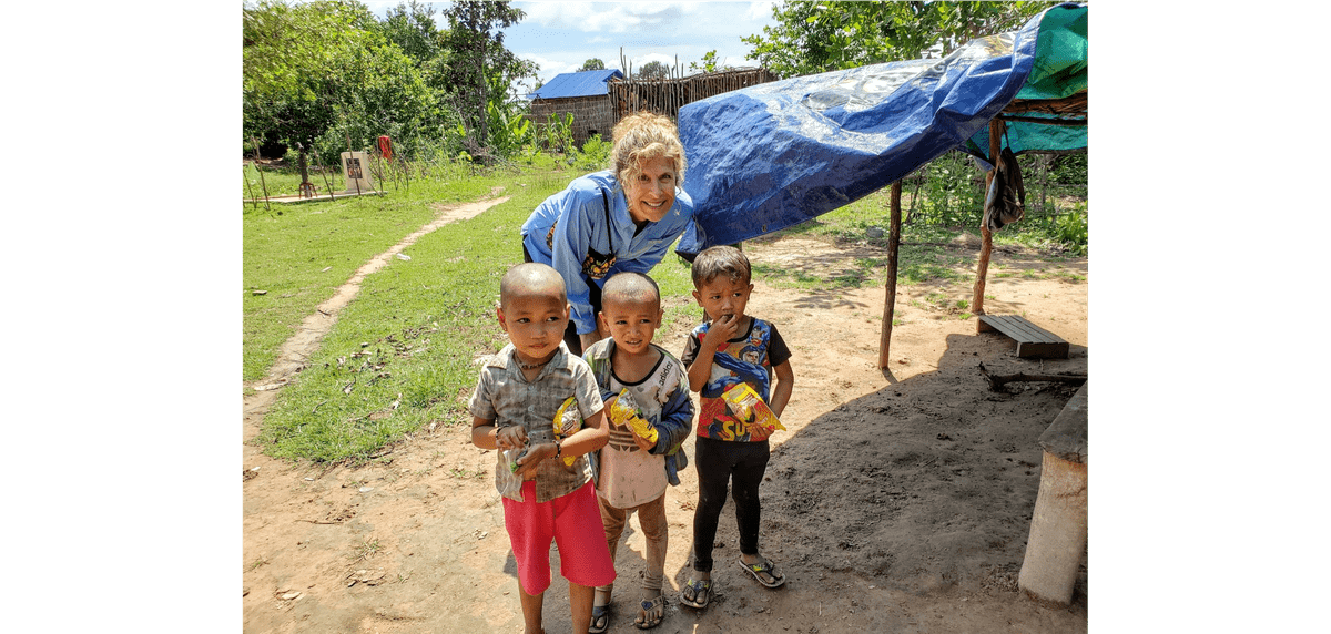 Trina with Cambodian children who are excited to receive their gift of noodles! Trina with Cambodian children who are excited to receive their gift of noodles!